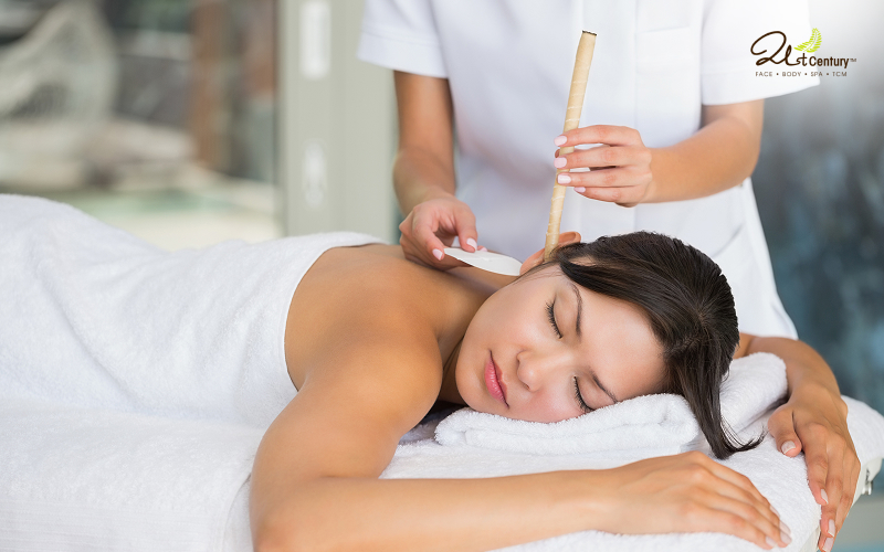 Woman-receiving-relaxing-ear-candle-therapy-at-a-spa